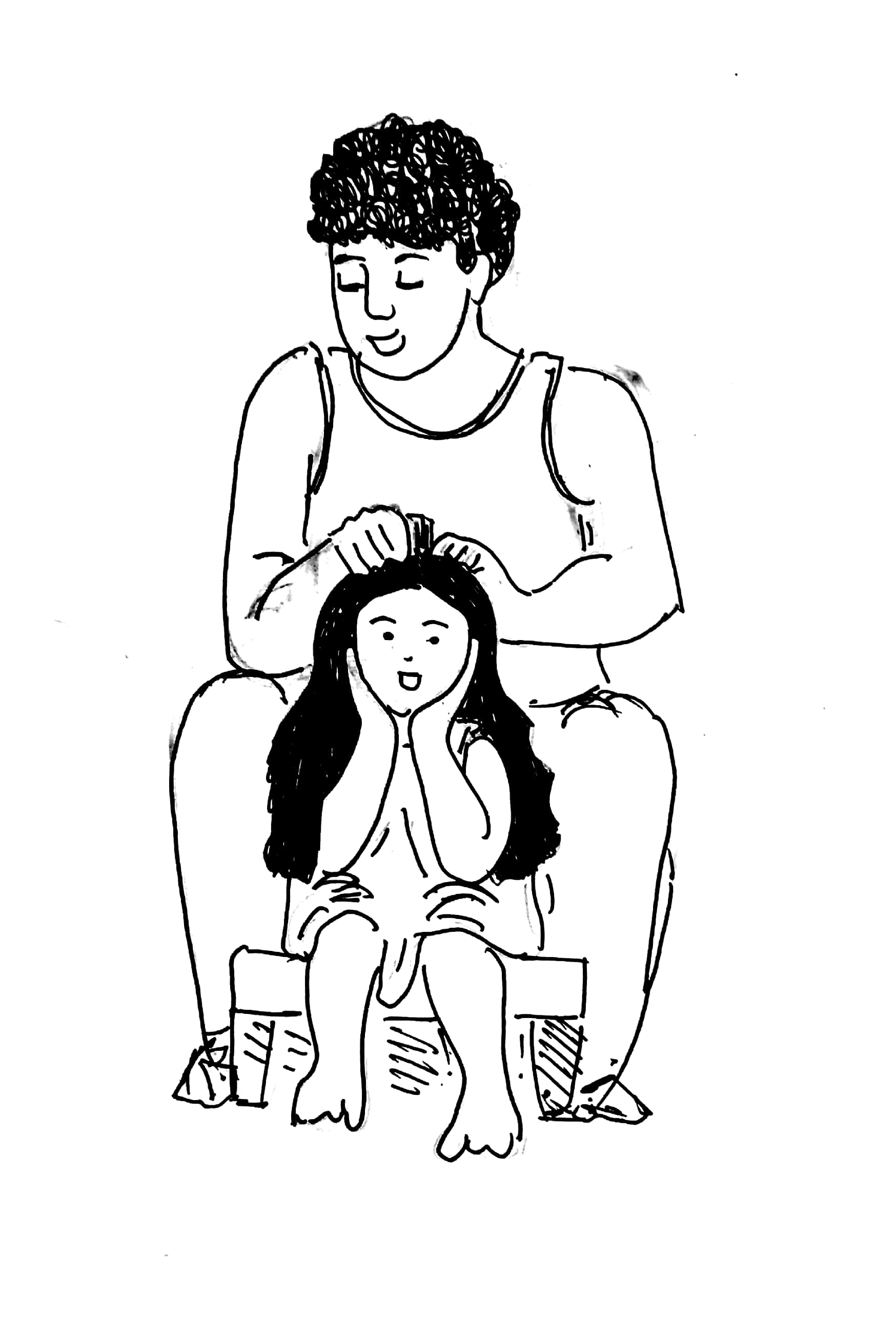Father making daughter's hair